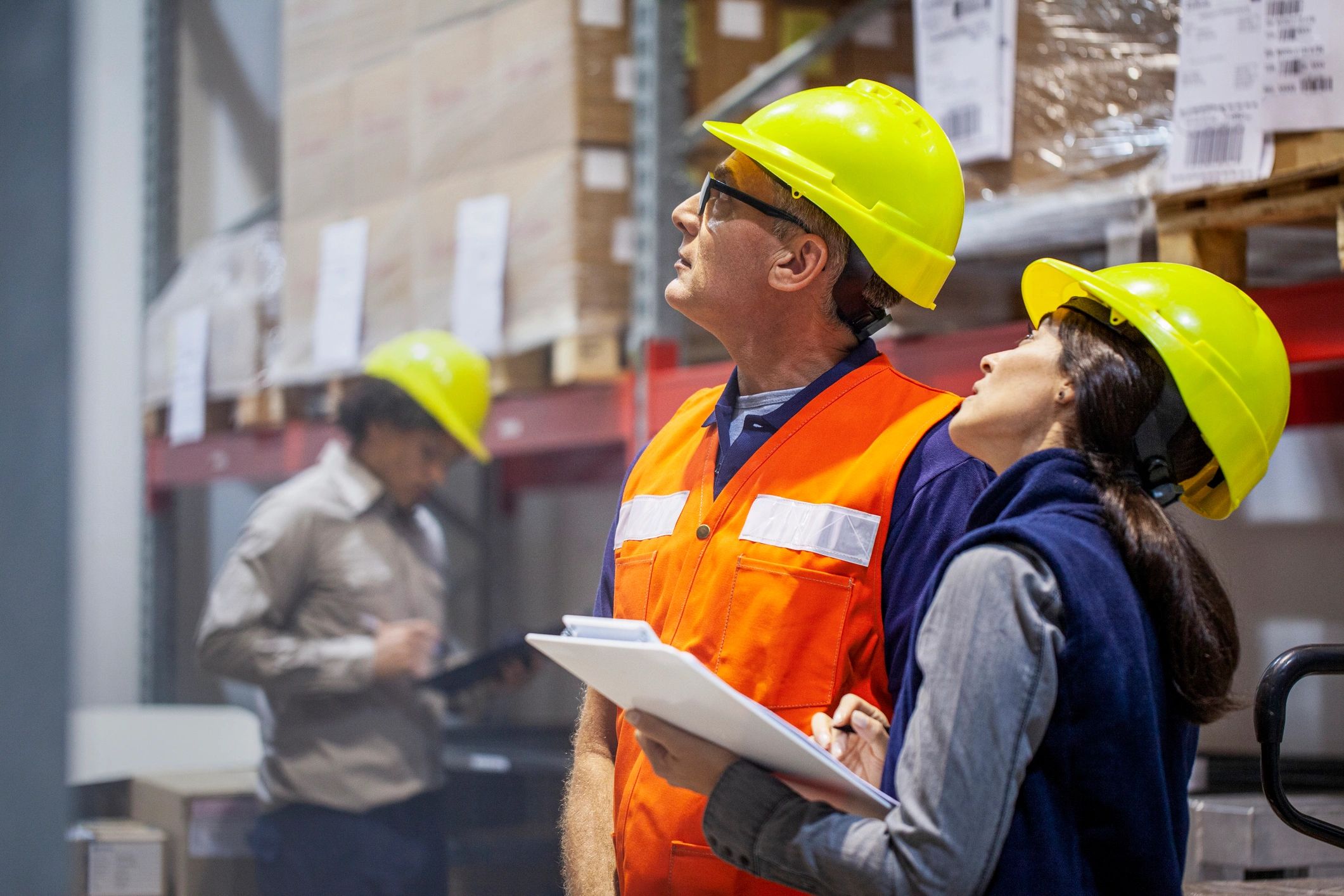 Warehouse team reviewing inventory operations